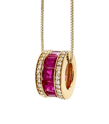 A 14K yellow gold pendant and necklace in a special and colorful design set with 1.51ct of