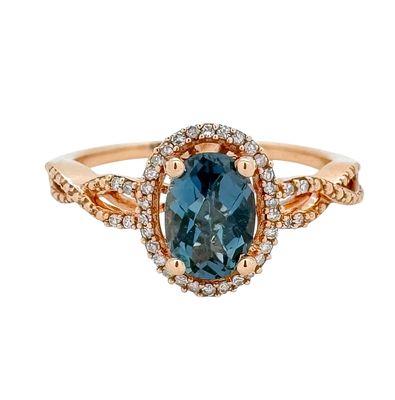 A classic and beautiful gold ring set with 1.35ct of white diamonds and a deep colored center