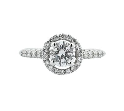 A white gold ring set with 0.60ct of natural white diamonds.
The central diamond is 0.30ct in