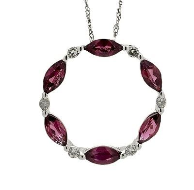 A 14K white gold pendant and necklace with a special design set with white diamonds and