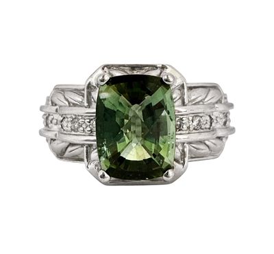 A luxurious 14K gold ring set with a 2.12ct central tourmaline gemstone and natural white