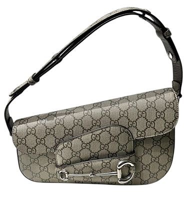GUCCI 
תיק כתף GUCCI SUPREME HORSEBIT 1955 
התיק עשוי בד קנבס בדגם מונוגרם 