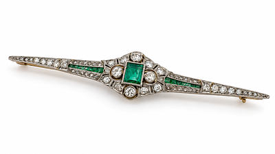 Antique Art Deco Platinum Emerald & Old European Cut Diamond Brooch, Circa 1920. An exquisite 