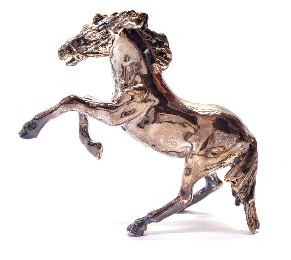 פיגורת כסף לאקטרופורמינג, קטנה, ישנה ויפה, בדגם סוס. חתומה 925. 
משקל: 23 גרם 
מידות מקסימליות 