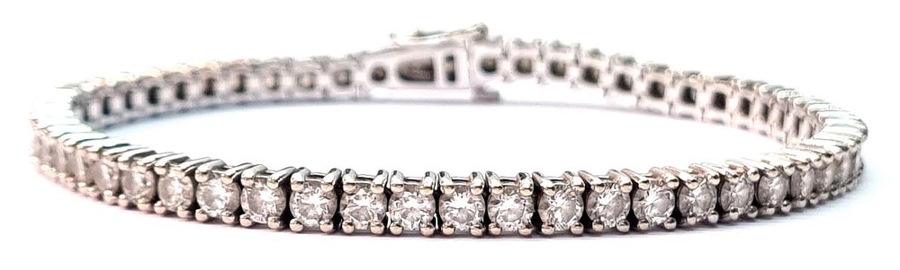 צמיד טניס, זהב לבן 14k, מודרני, יוקרתי ויפהפה. משובץ 55 יהלומי מעבדה איכותיים ונוצצים במשקל 