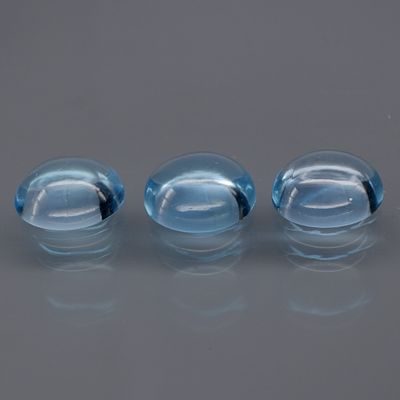 3 Topaz - 11.69cts - Brazil. GEM TYPE: Natural Topaz 
SHAPE: Cabochon 