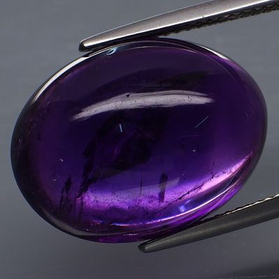 Amethyst - 19.40cts - Bolivia. GEM TYPE: Natural Amethyst 
SHAPE: Oval Cabochon 