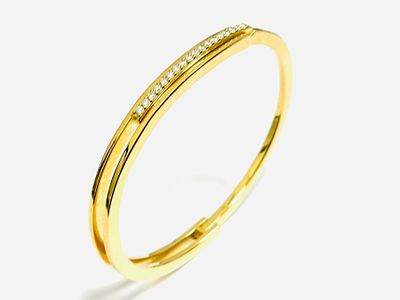 Gioielleria Corvino - Bracciale modello manetta in oro giallo 18 KT 750% con diamanti naturali 