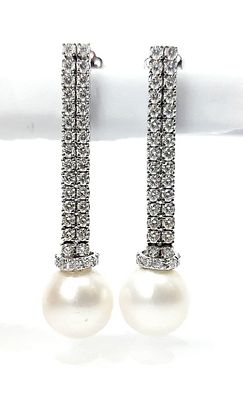 Gioielleria Corvino - Orecchini modello tennis firmati Astralia con perle 3.20 carati in oro 