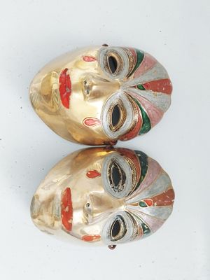 2 brass masks