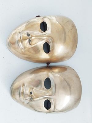2 brass masks