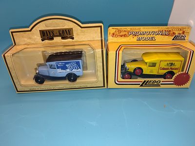 TWO BOXED DIECAST DAYS GONE MODEL CARS