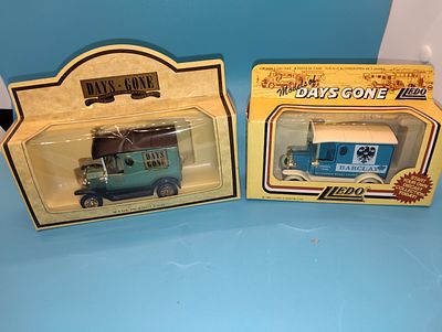 TWO BOXED DIECAST DAYS GONE MODEL CARS