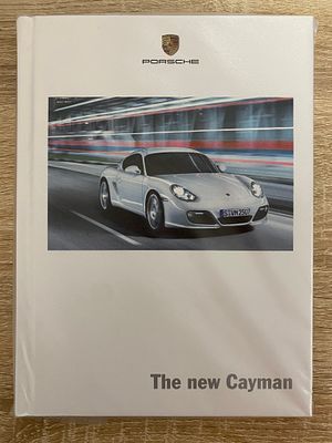 ORIGINAL PORCHE THE NEW CAYMAN VEHICLE BROCHURE IN A4 COVER . ORIGINAL PORCHE THE NEW CAYMAN 