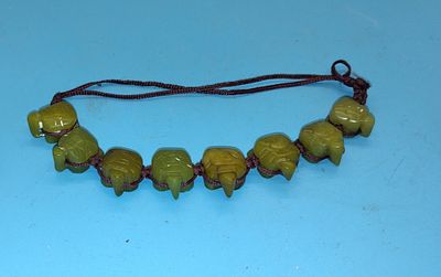 VERY NICE JAPANESE TENGU BRACELET EITHER JADE OR ADVENTURINE