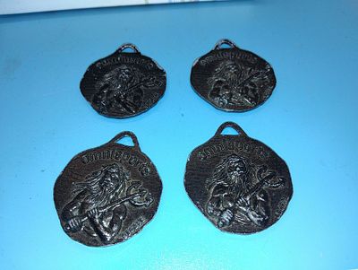 SET OF FOUR OMNISPORTS TOKENS