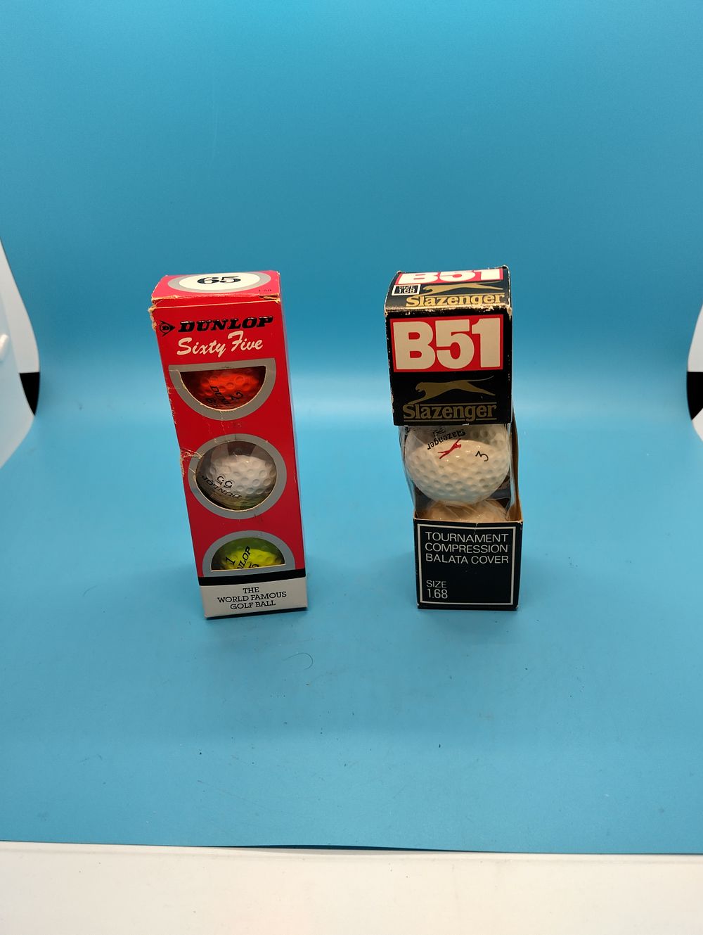 TWO NEW BOXES OF VINTAGE GOLF BALLS AND TWO BOXES OF LAKE BALLS CHECK BOTH PICS