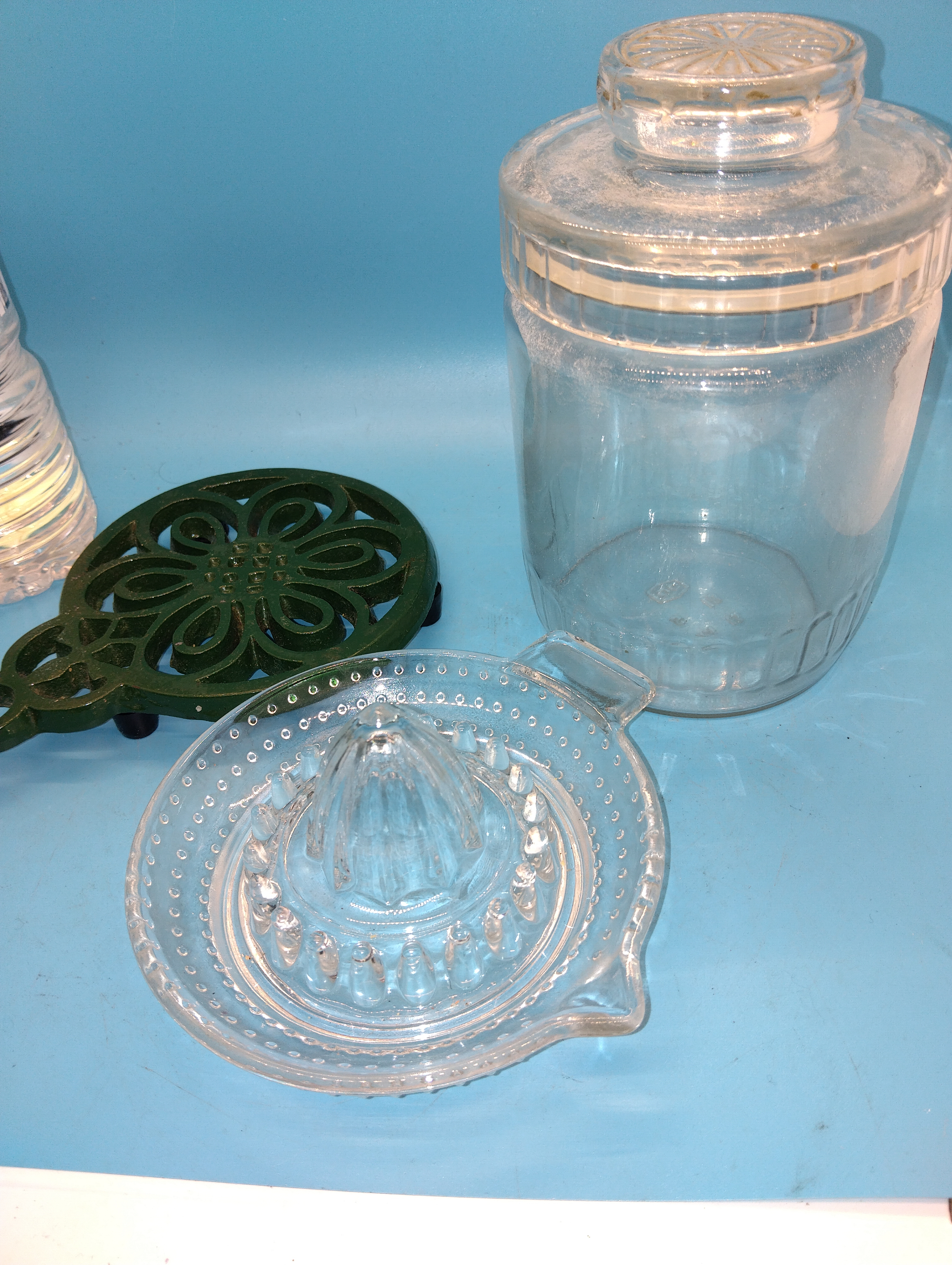 THREE KITCHEN ITEMS LEMON JUICER POT STAND AND VINAGE SEALED GLASS JAR