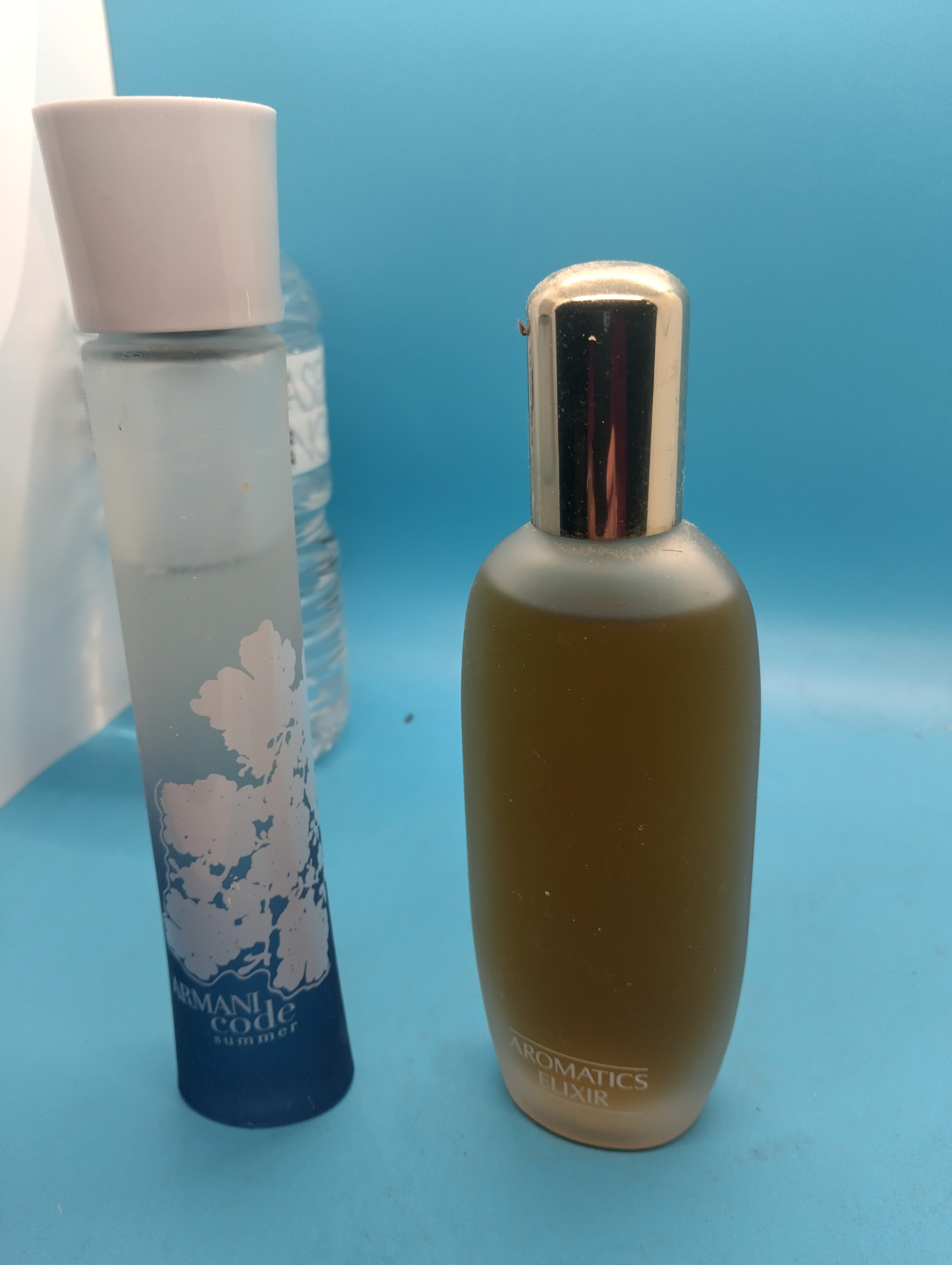 TWO BOTTLES OF PERFUME INCLUDING ARMANI PARCIALLY USED OTHER FULL