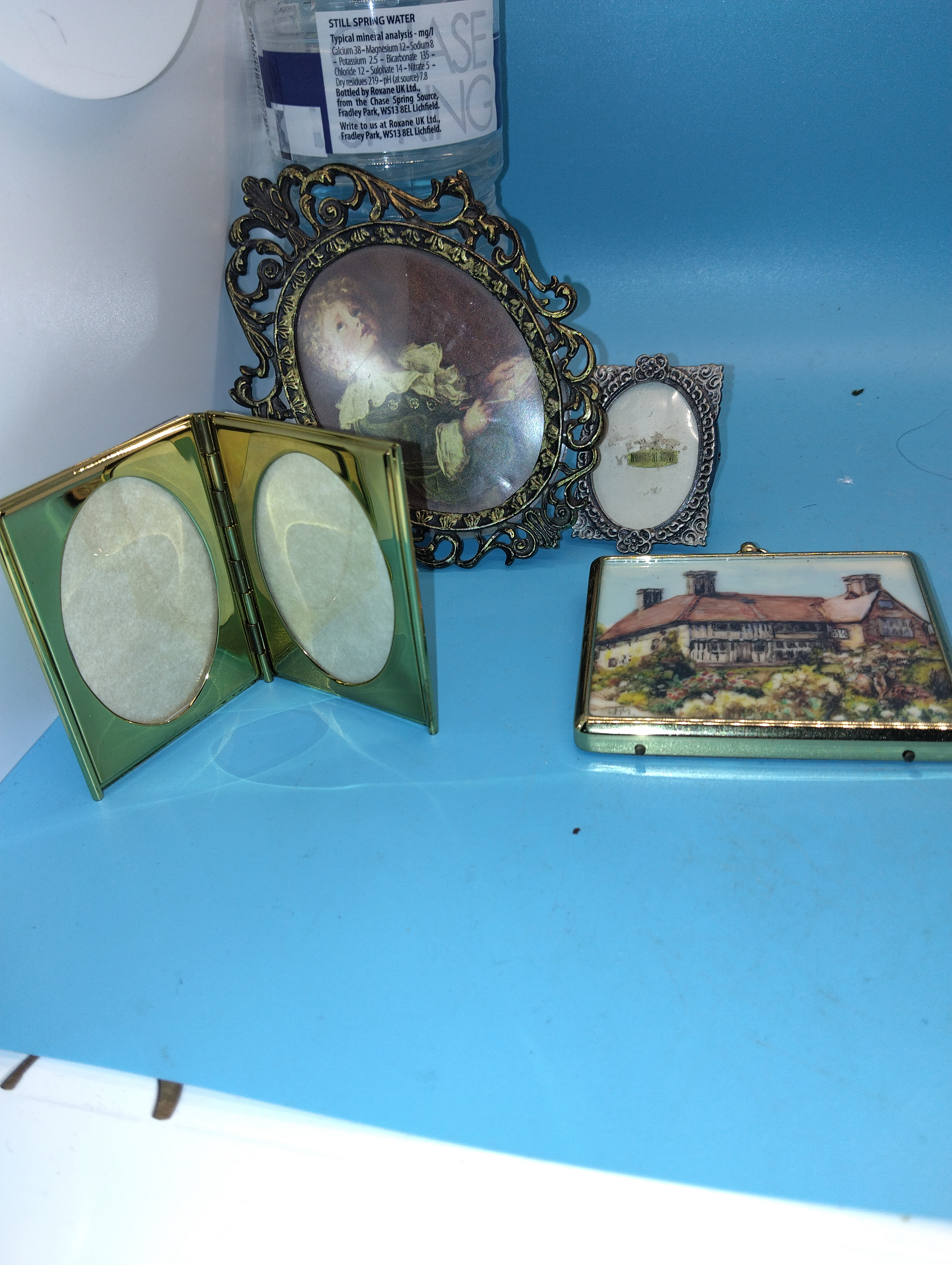 FOUR SMALL VINTAGE PICTURE FRAMES
