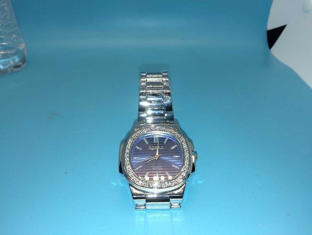 A NEW Rosra Quartz Wristwatch with Blue Textured Dial and Crystal-Set Bezel