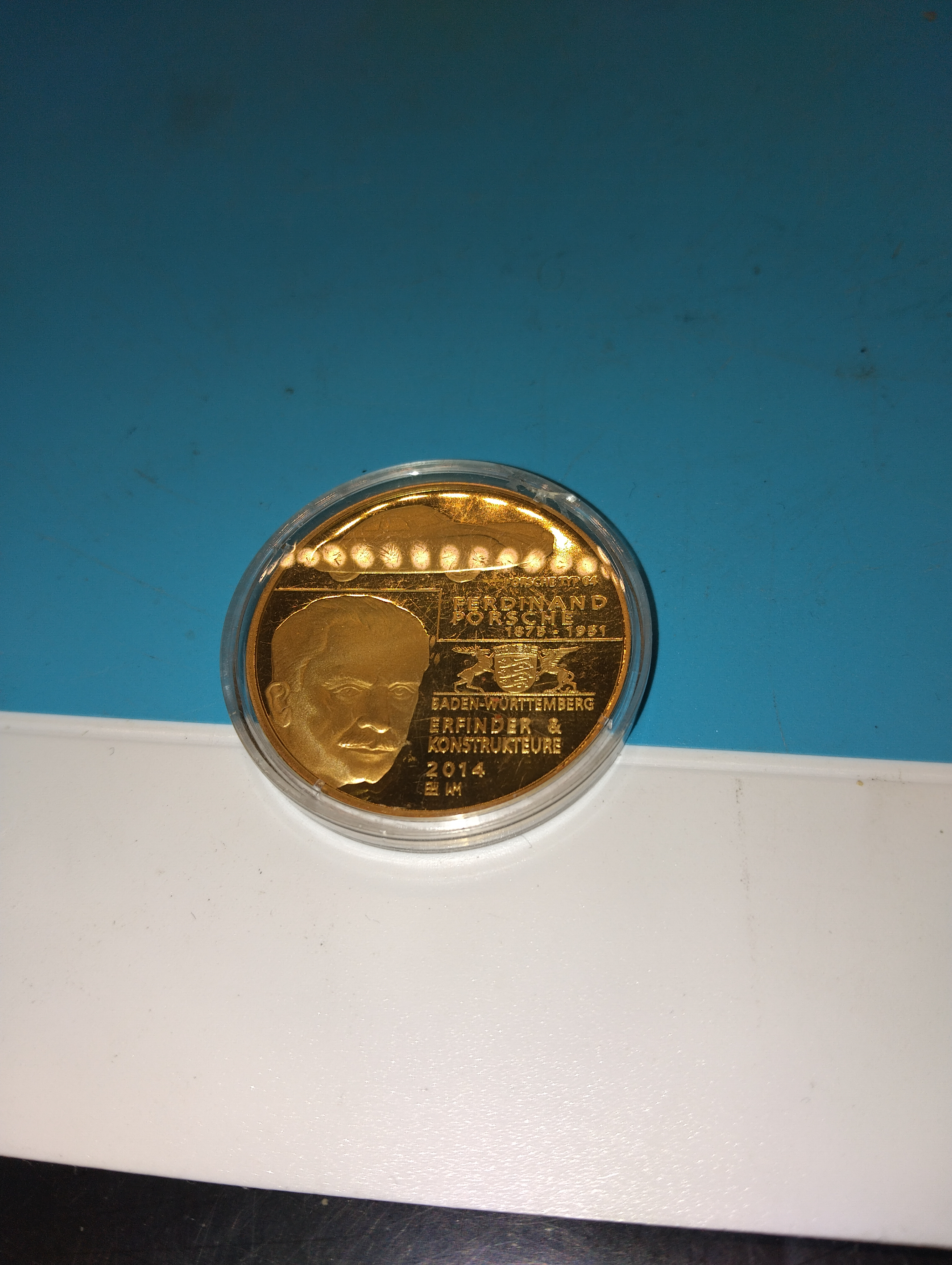 A 2014 Ferdinand and Ferry Porsche Commemorative Medal Layered in 24 Carat Gold