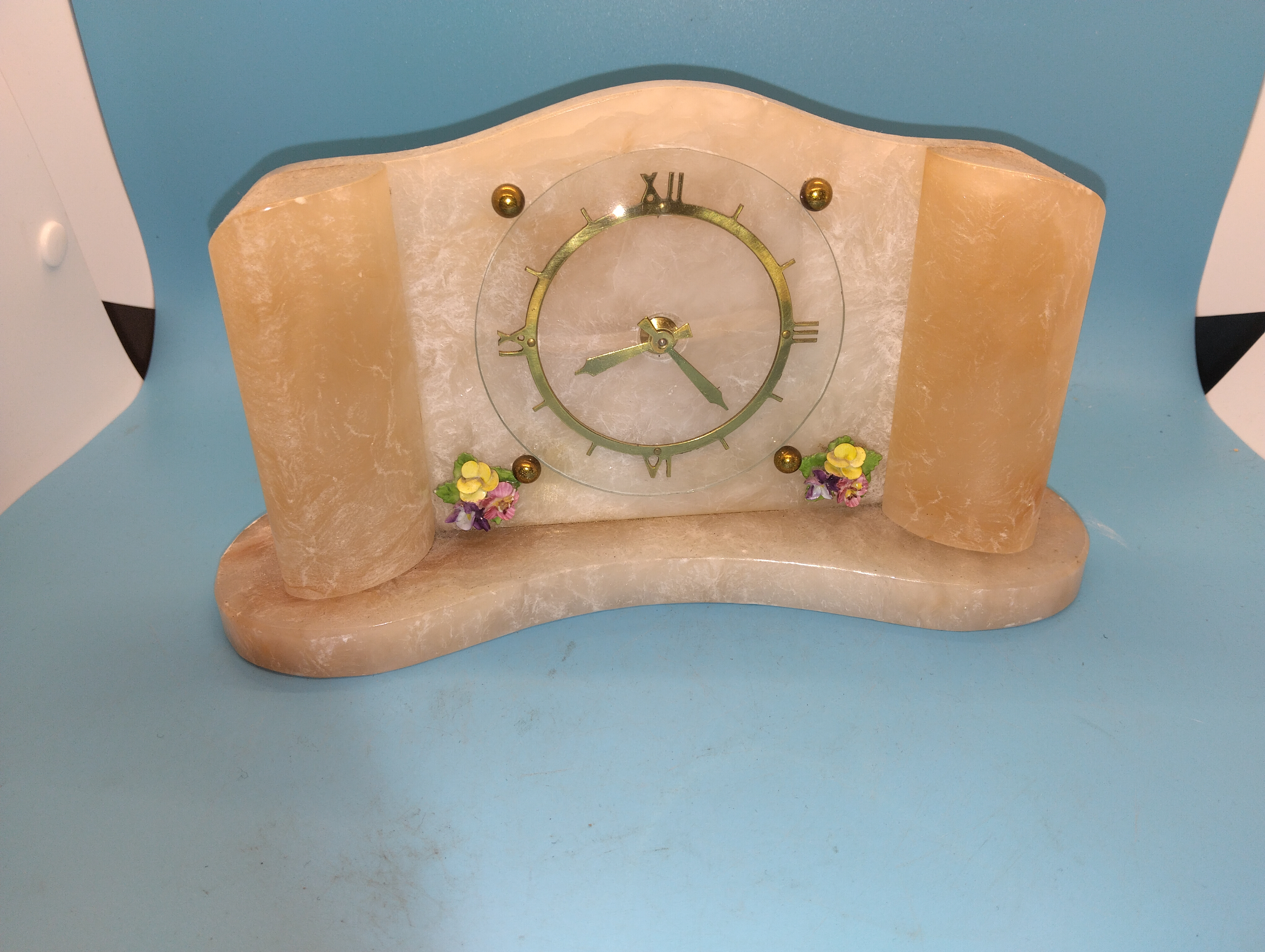 An Art Deco Style Carved Alabaster Mantel Clock