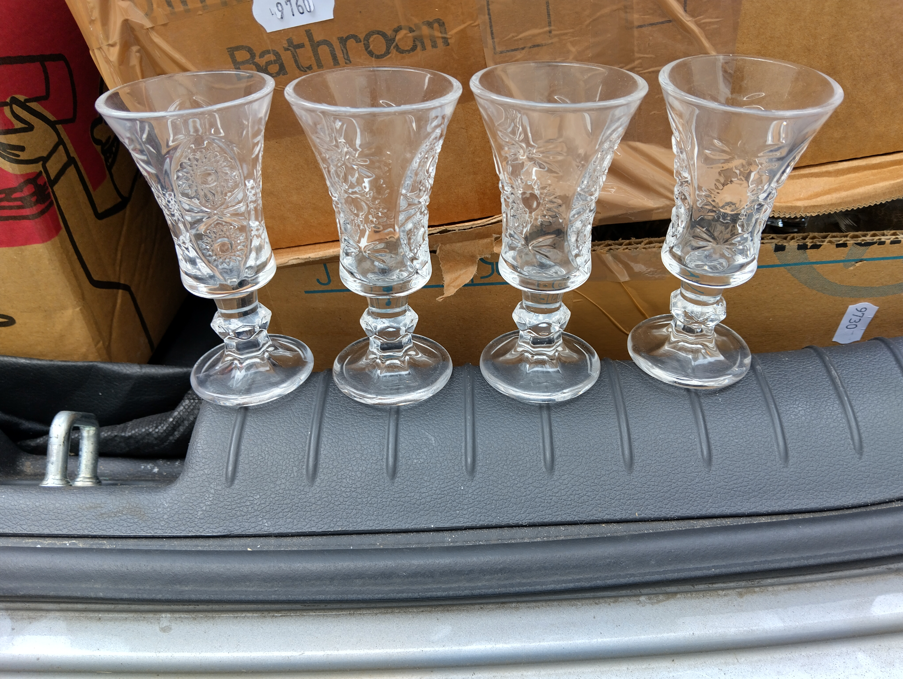 A Set of Clear Pressed Glass Stemmed Liqueur Glasses