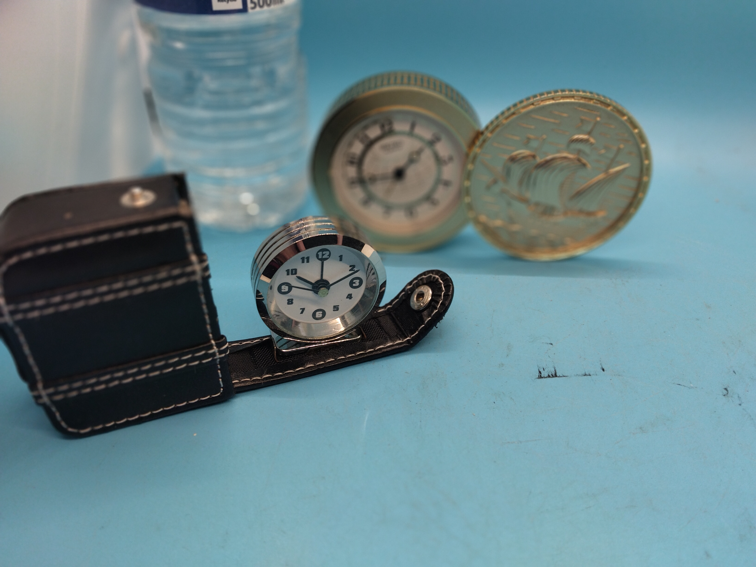 TWO SMALL CLOCKS INCLUDING SHIP THEMED