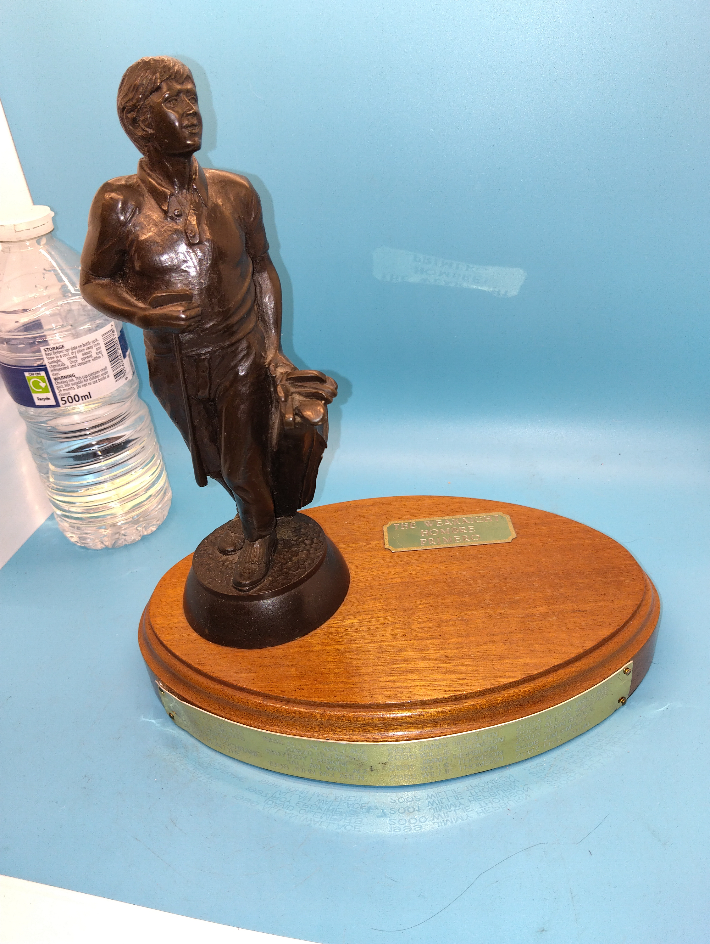 A Perpetual Wooden and Patinated Metal Golf Trophy