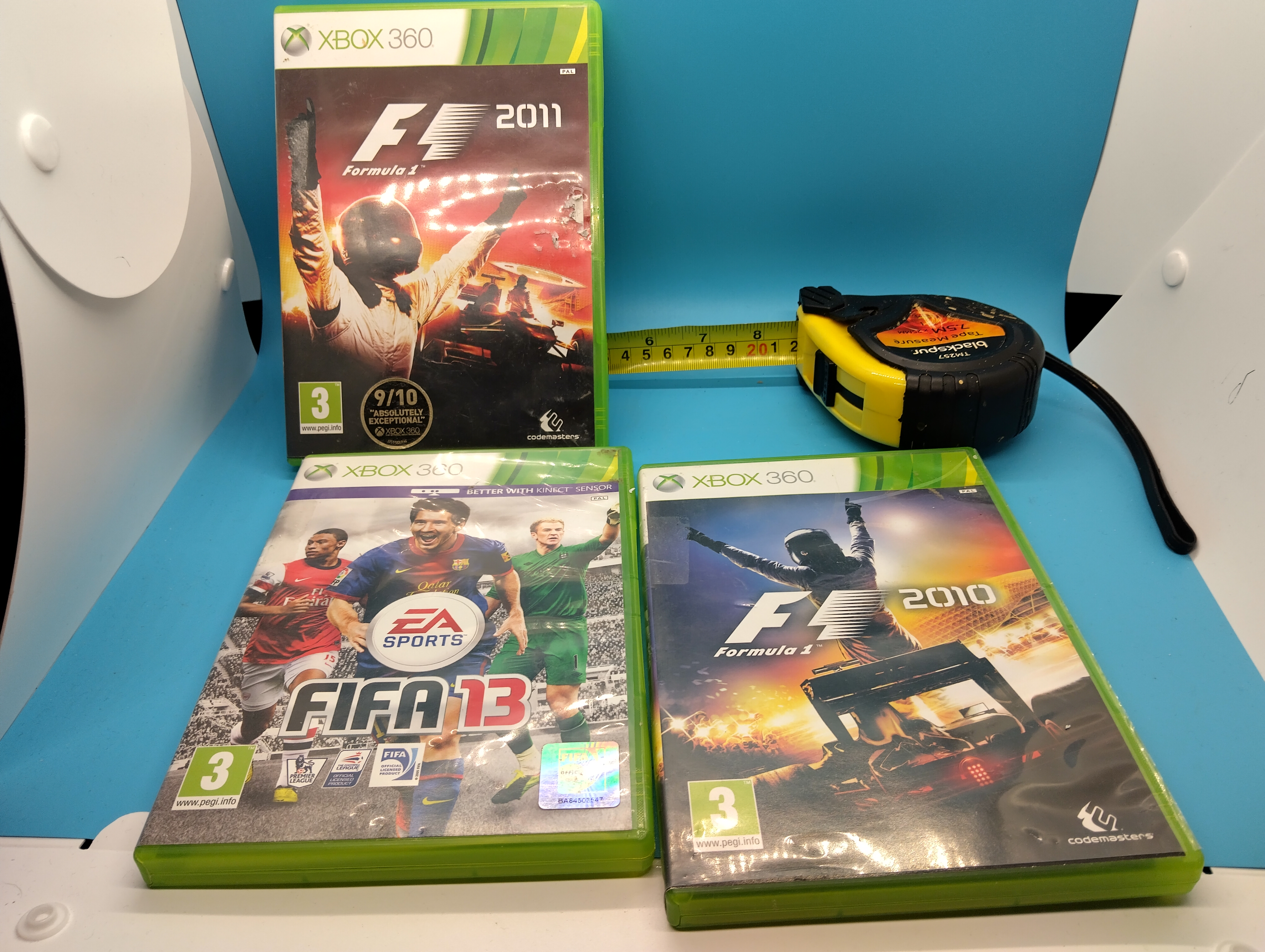 A Trio of PAL Region Xbox 360 Video Games Comprising F1 2010 F1 2011 and FIFA 13