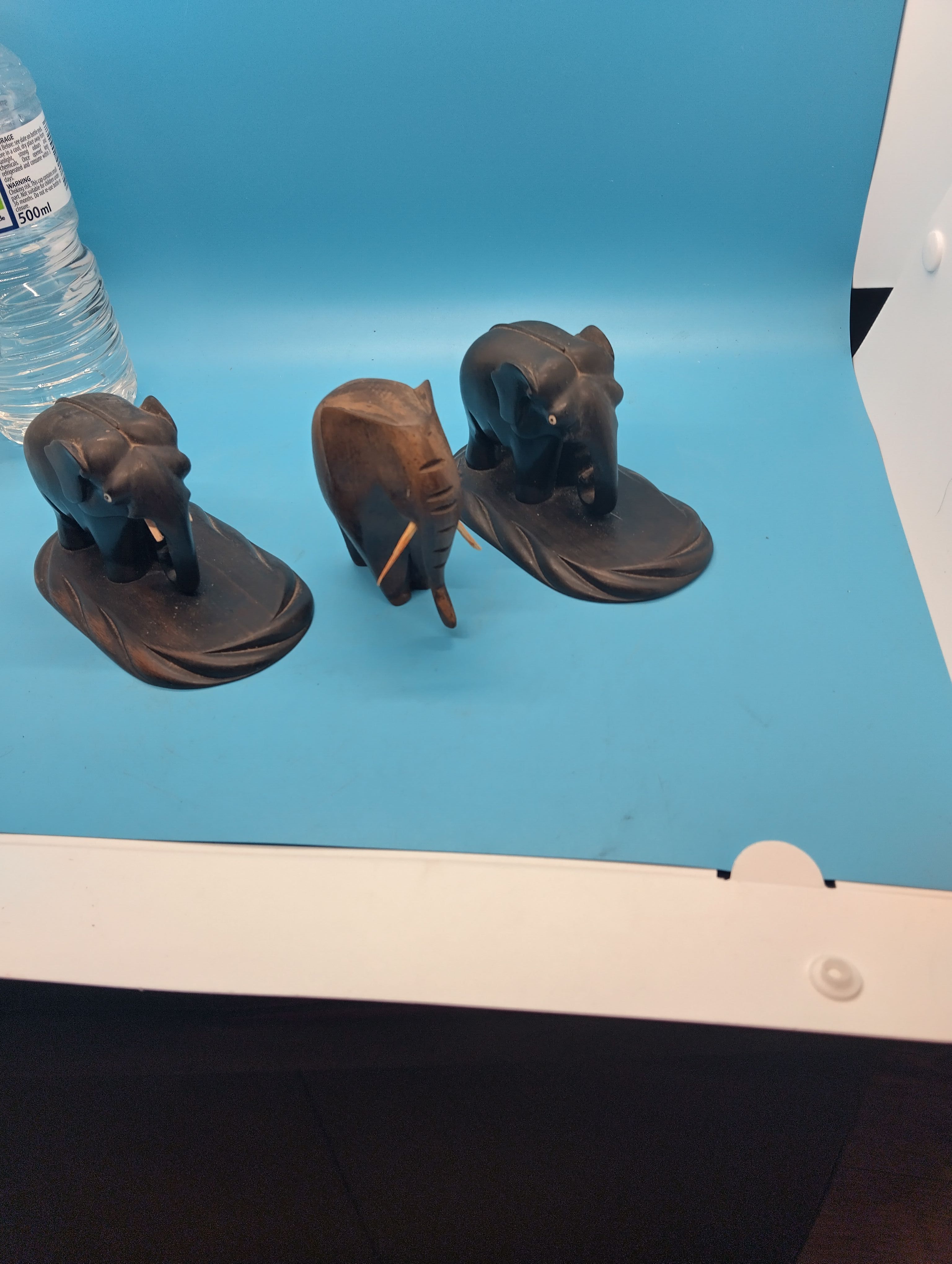 A Trio of Early 20th Century Carved Ebony Elephant Figurines