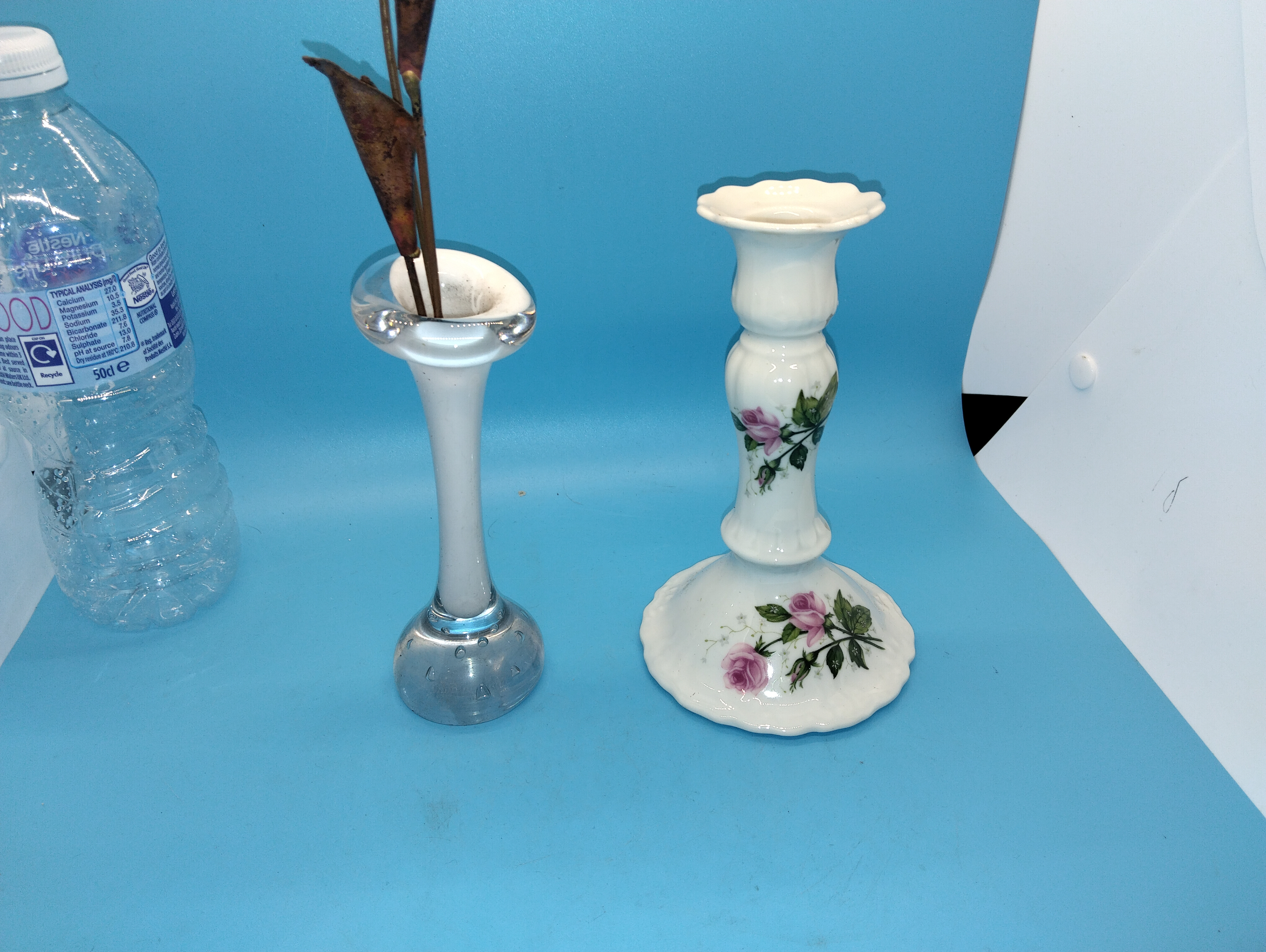 A Limoges Porcelain Candlestick and a Metal Mounted Glass Bud Vase