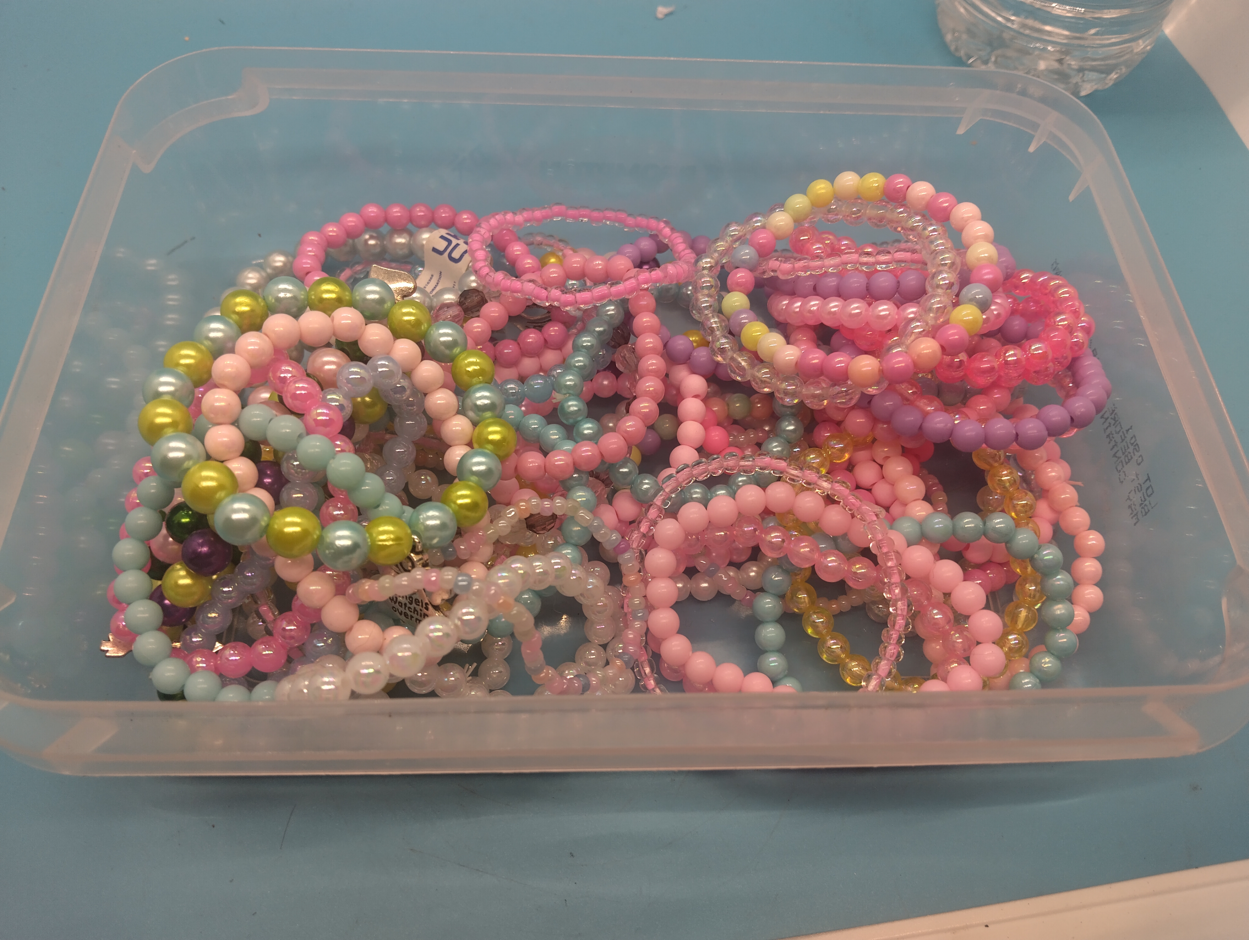 A Collection Of Coloured Beaded Costume Bracelets For Children