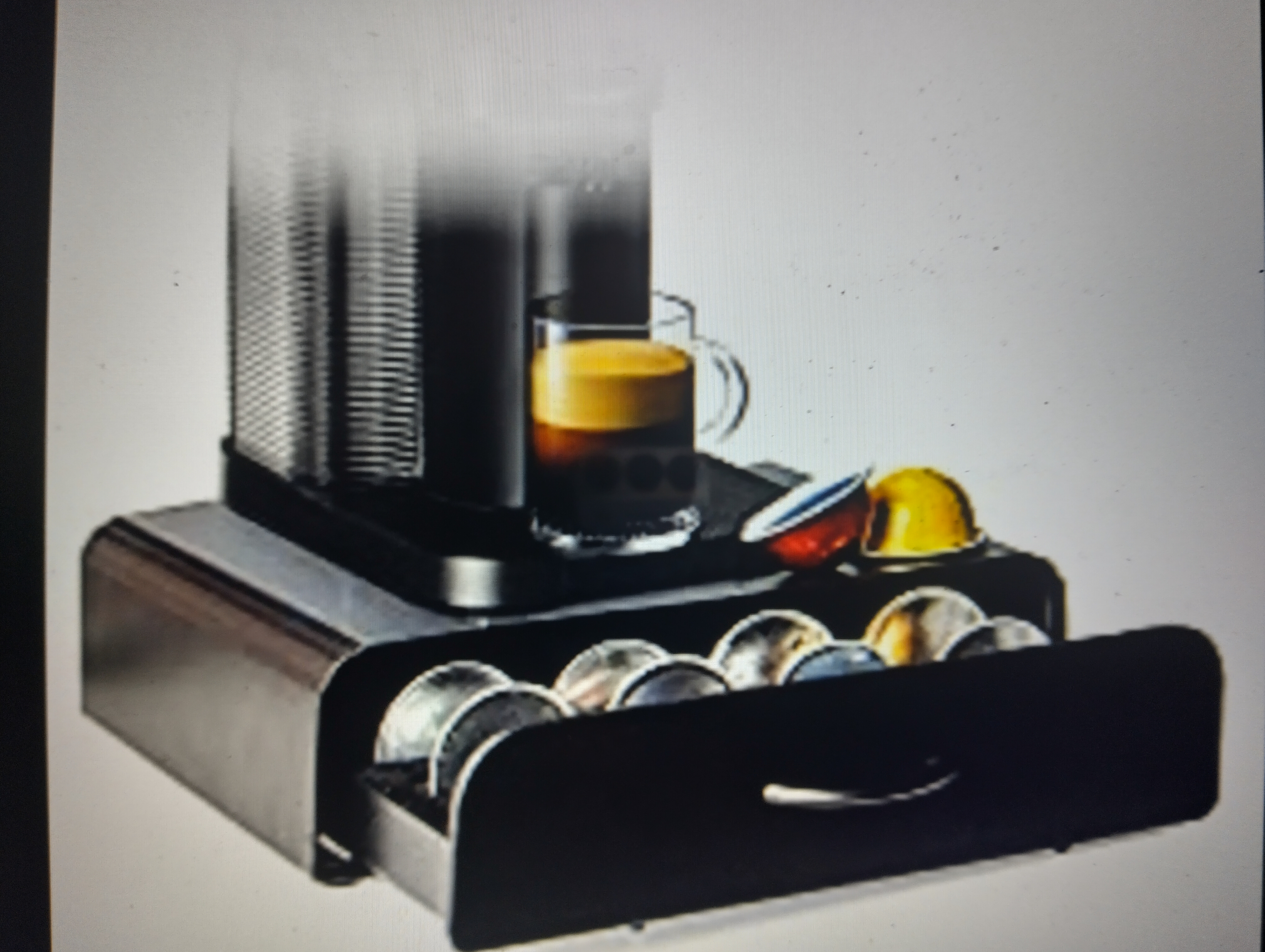 A Nespresso Vertuo Style Coffee Machine and Capsule Storage Drawer