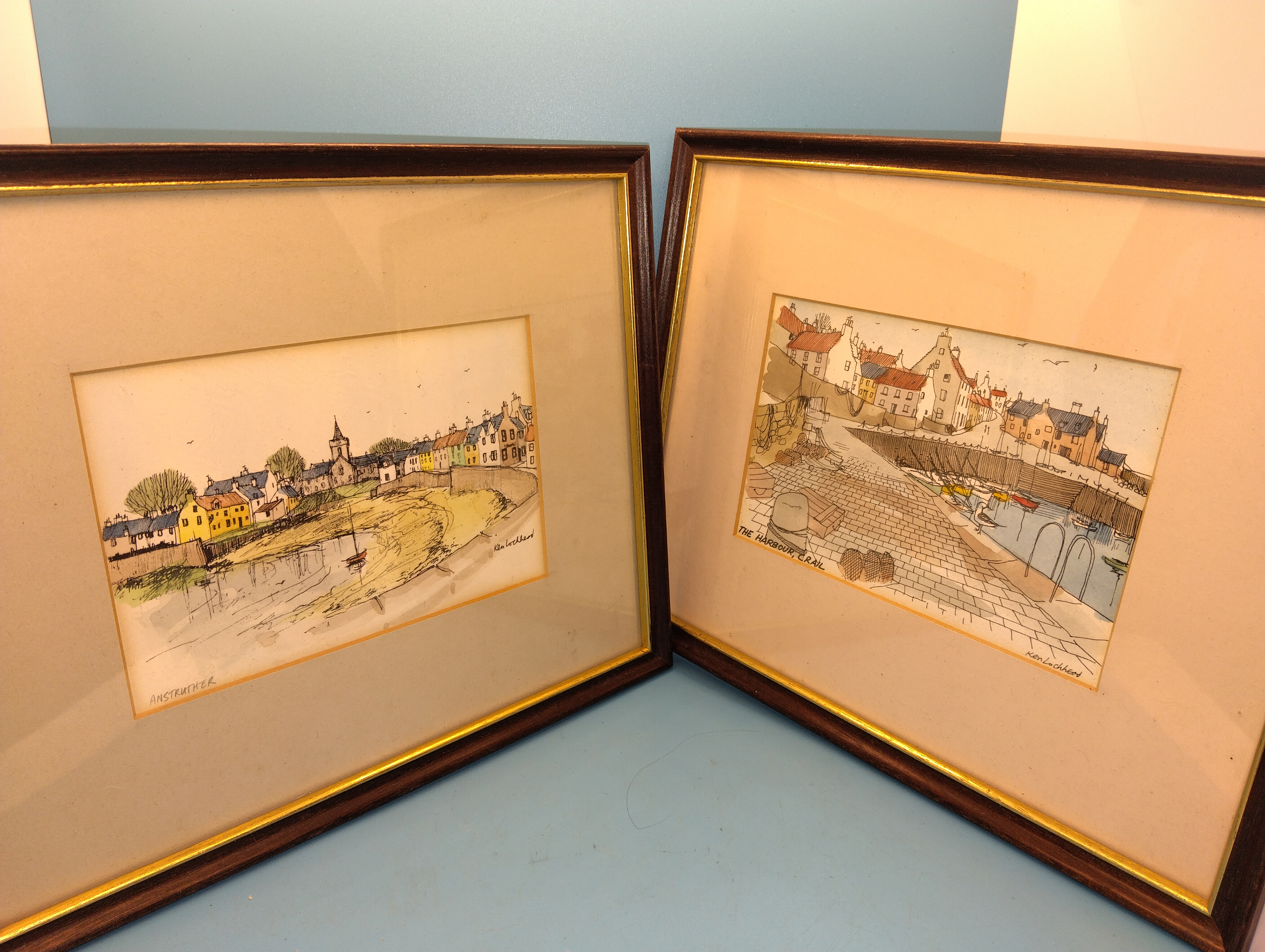 TWO SMALL FIFE FRAMED HAND PAINTED FROM ORIGINAL DRAWINGS OF CRAIL AND ANSTRUTHER BY KEN LOCHEAD