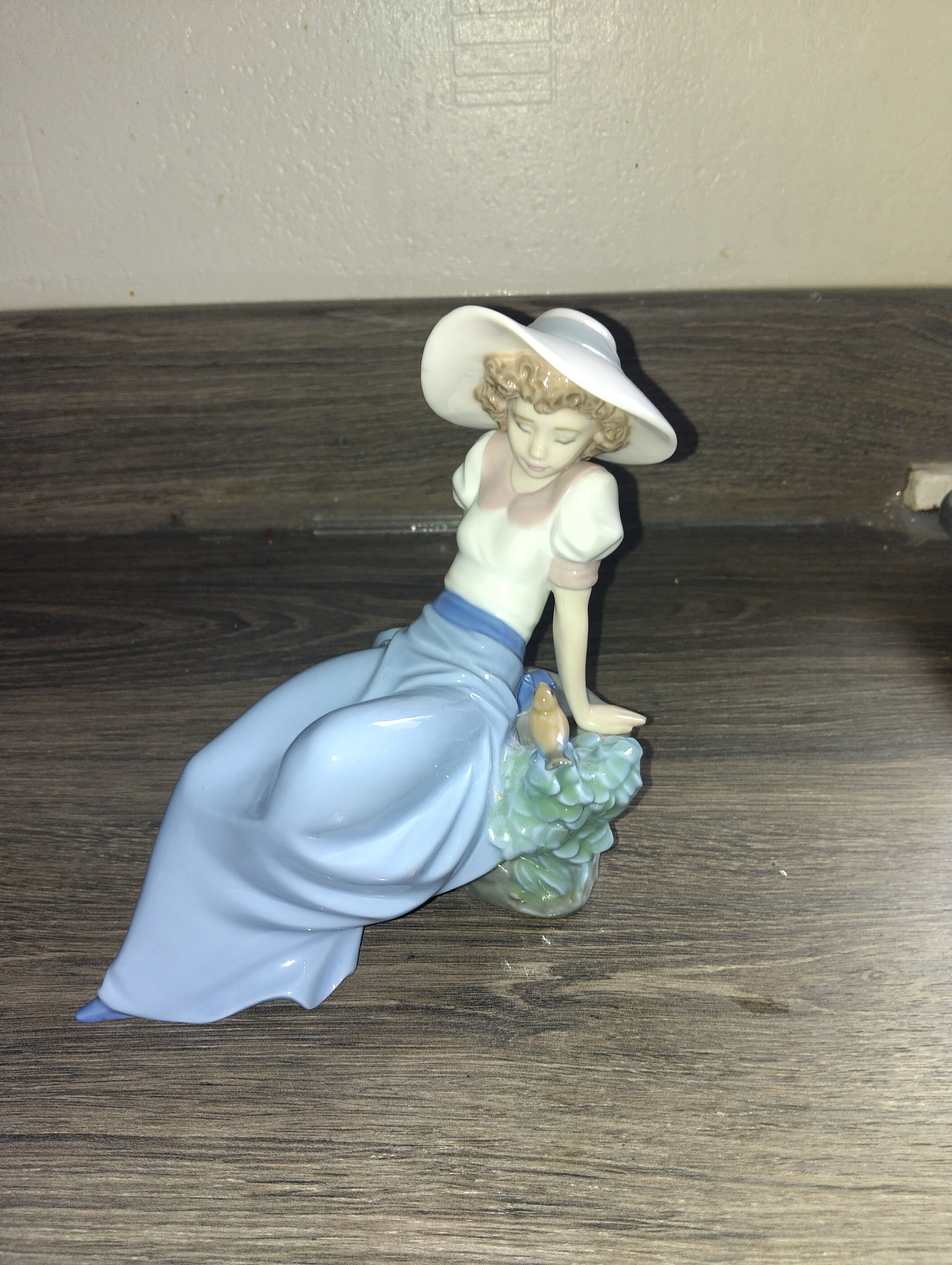 VERY NICE NAO LADY RECLINING WITH SMALL BIRD FIGURE