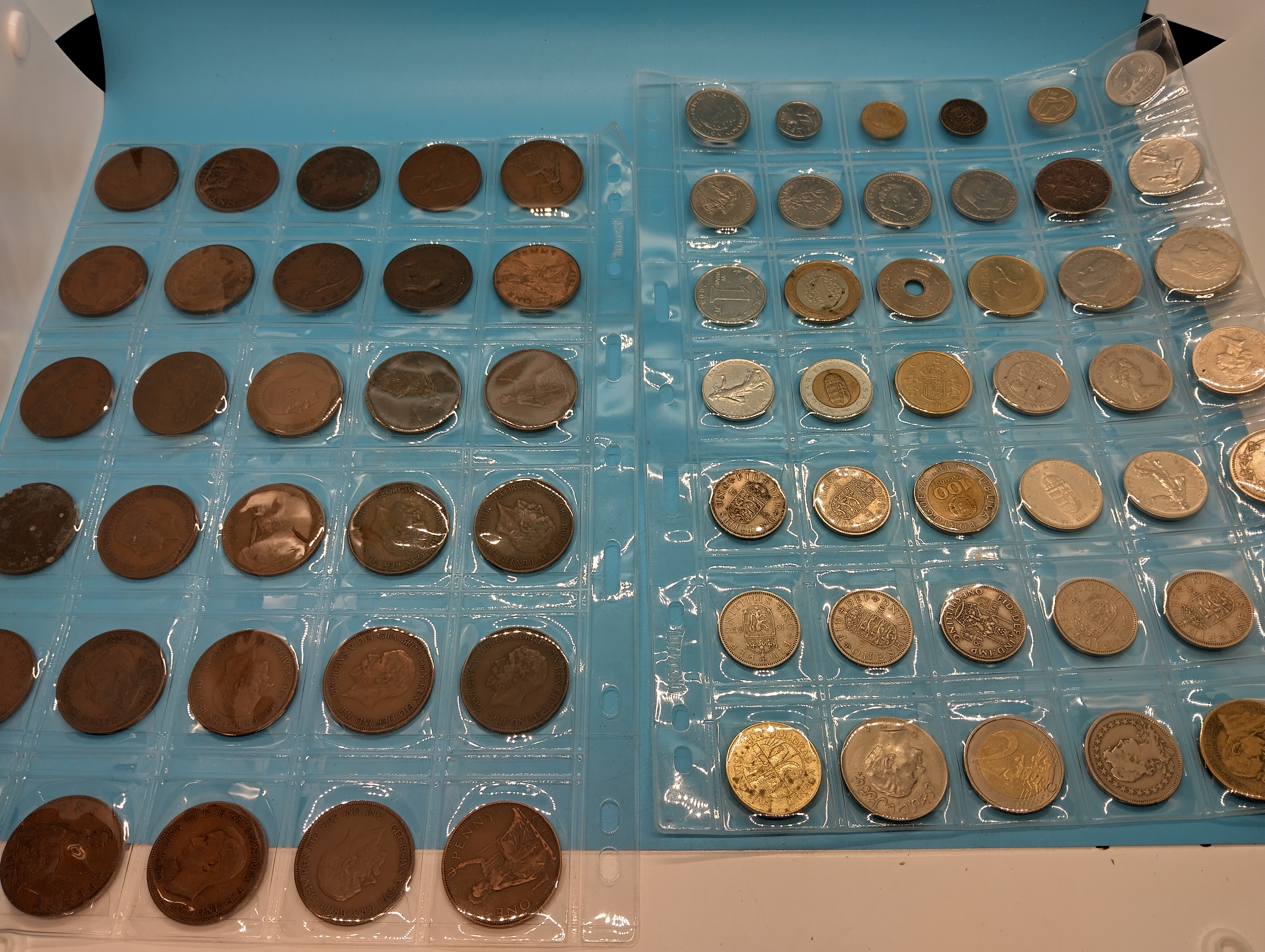 TWO SHEETS OF INTERNATIONAL AND UK COLLECTIBLE COINS