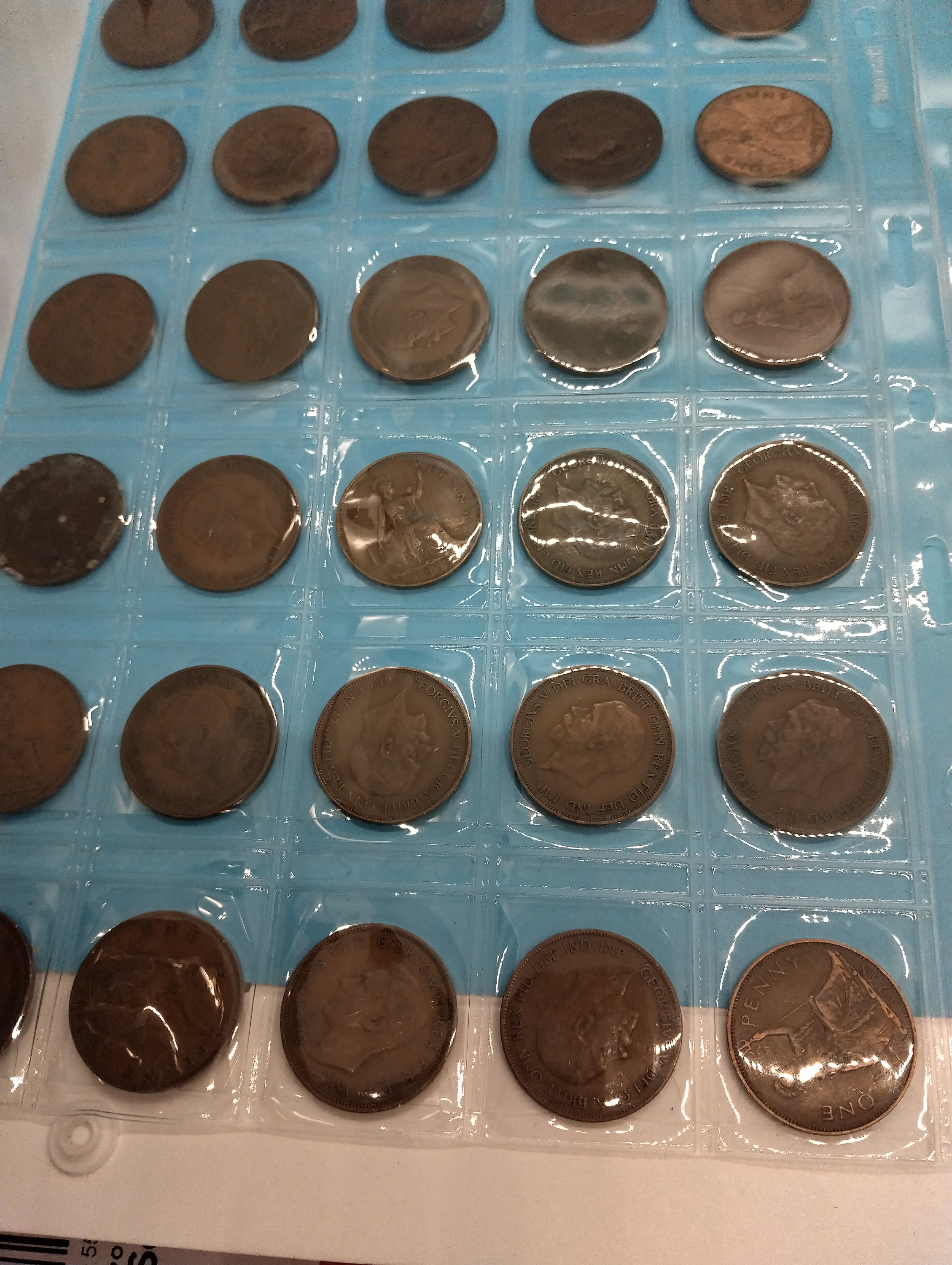 TWO SHEETS OF INTERNATIONAL AND UK COLLECTIBLE COINS
