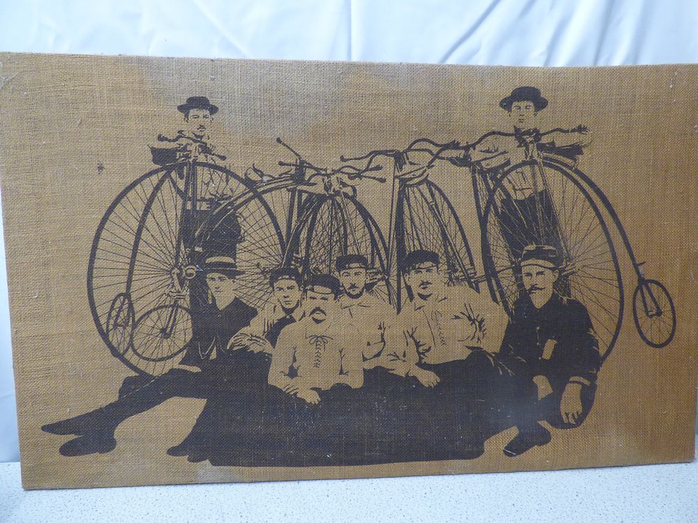Lot 175: Decorative Wall Hanging with Vintage Bicycle Print on Hessian - Known as 'Penny-Farthing Bicycles or also known as High Wheelers