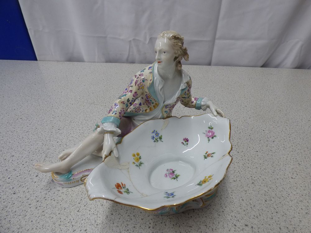 Lot 207: A Meissen Porcelain Figurine 1810 of a Seated Male with Bowl