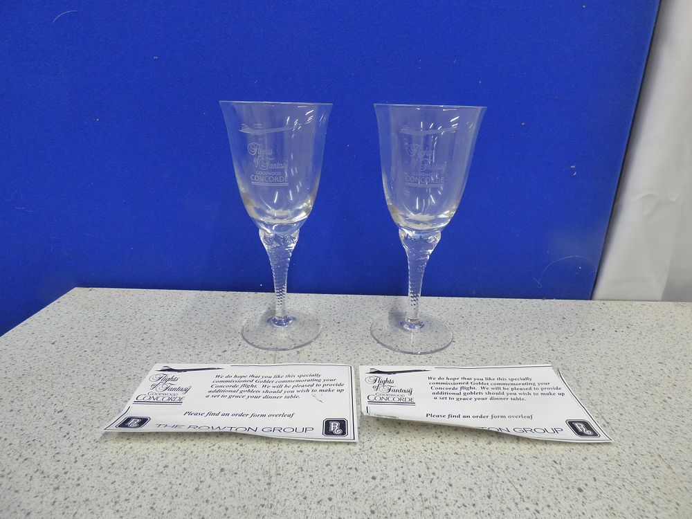 Lot 227: A Pair of Clear Glass 'Flights of Fantasy' Concorde Goblets