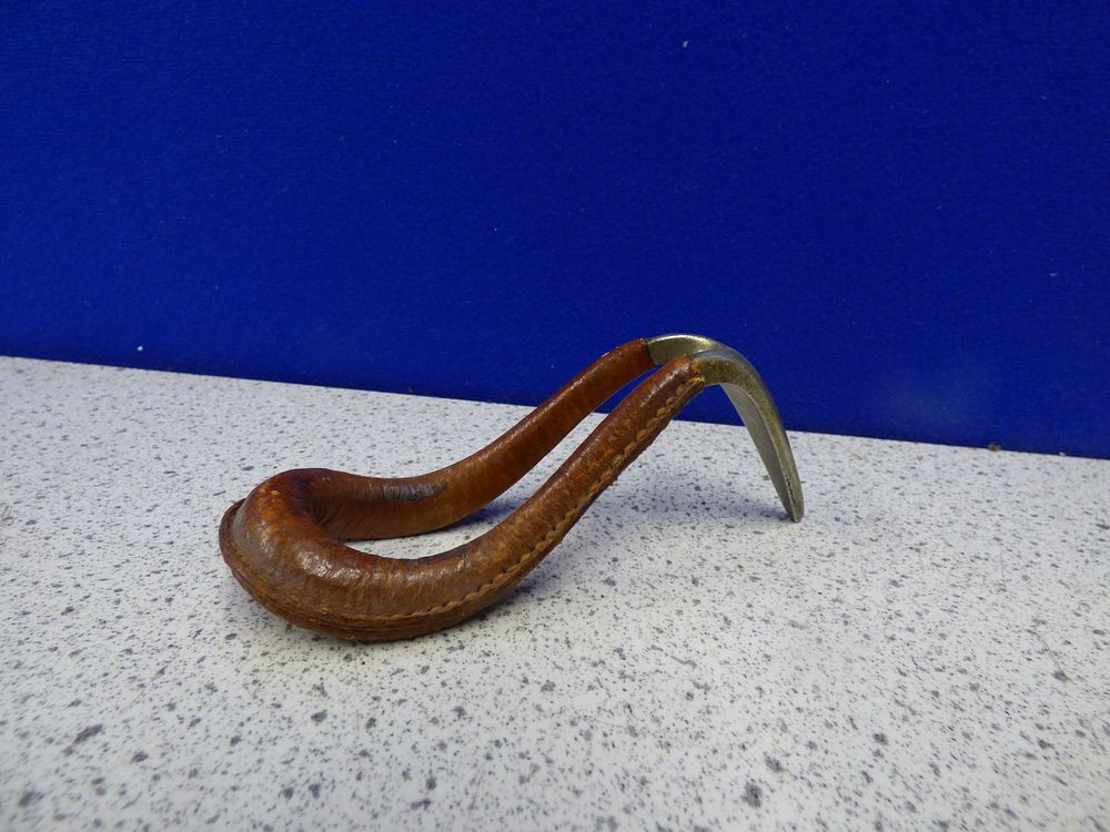 Lot 232: A Vintage Brown Leather Carl Aubock Pipe Holder