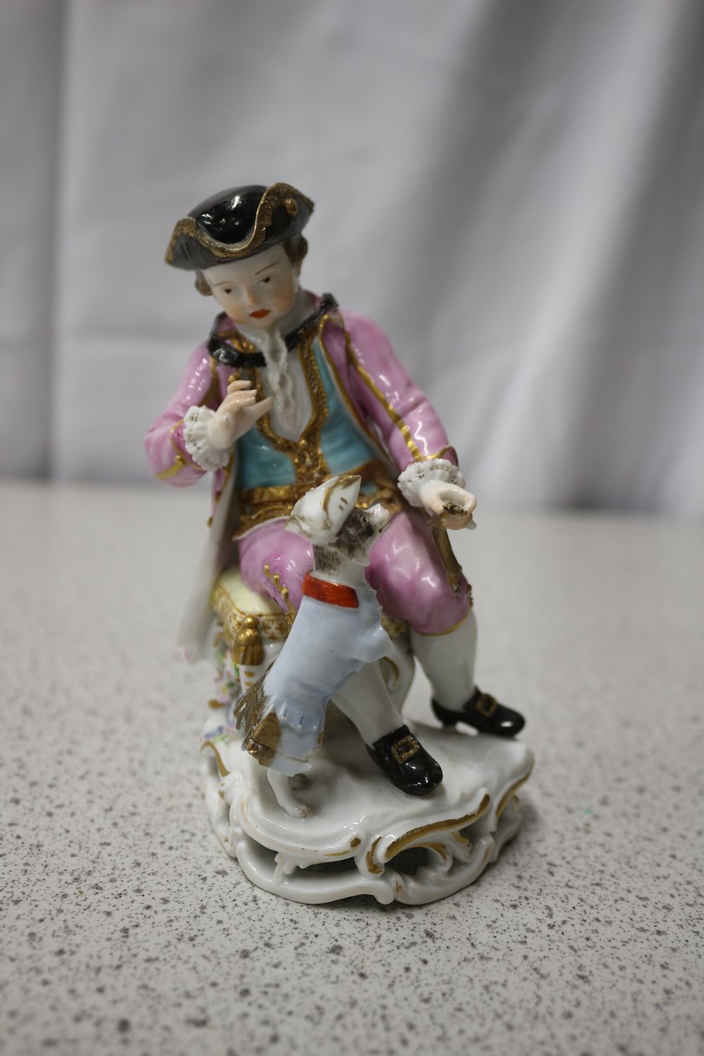 Lot 255: A Meissen Porcelain Figurine of a Boy and Dog