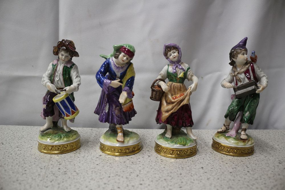 Lot 256: A Group of Four Volkstedt Porcelain Figurines