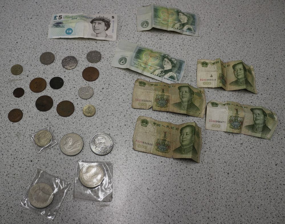 Lot 175: A Collection of International Banknotes and Coins