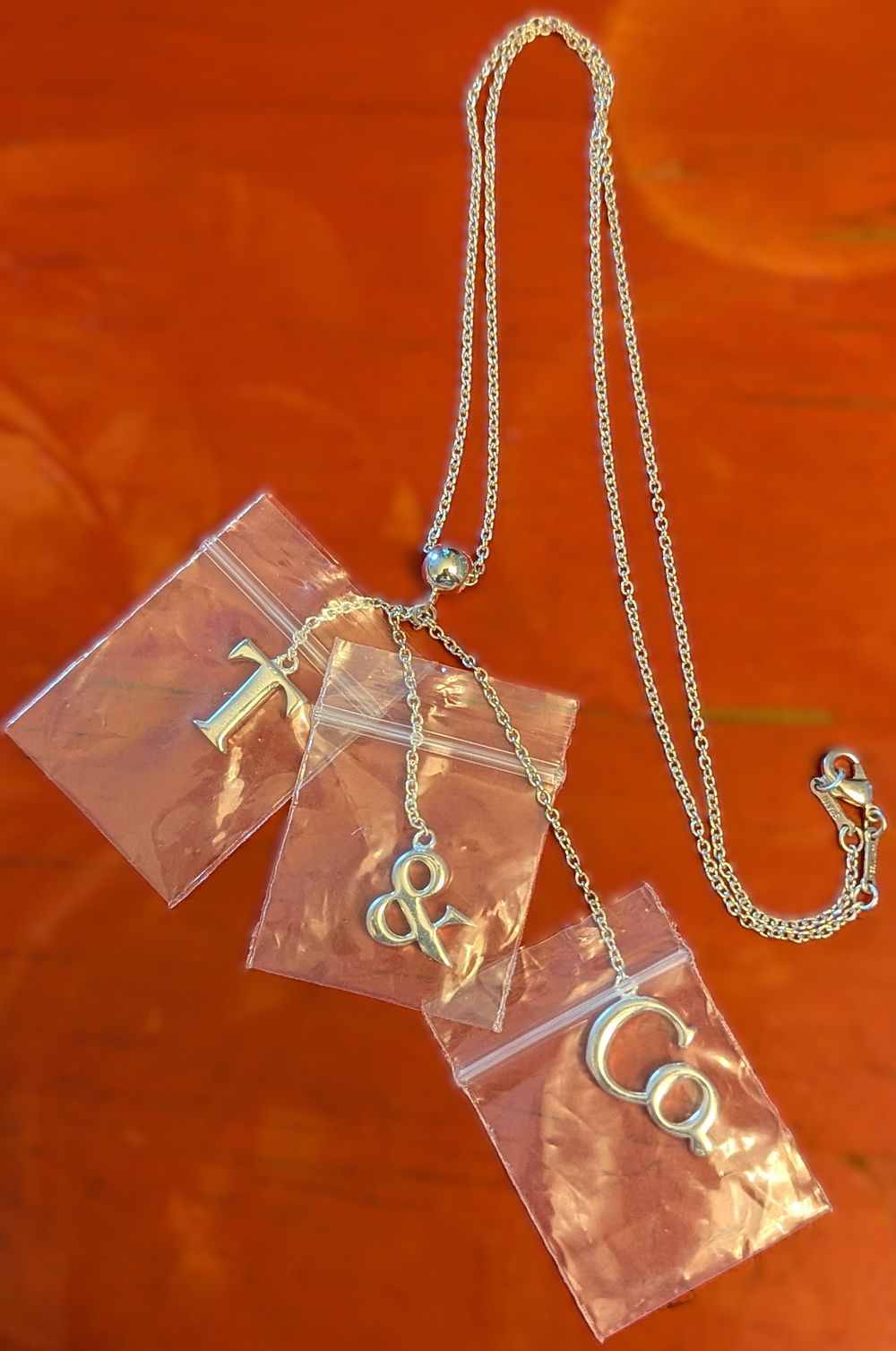 Lot 182: Tiffany & Co. Marked Sterling Silver 'T & Co.' Necklace