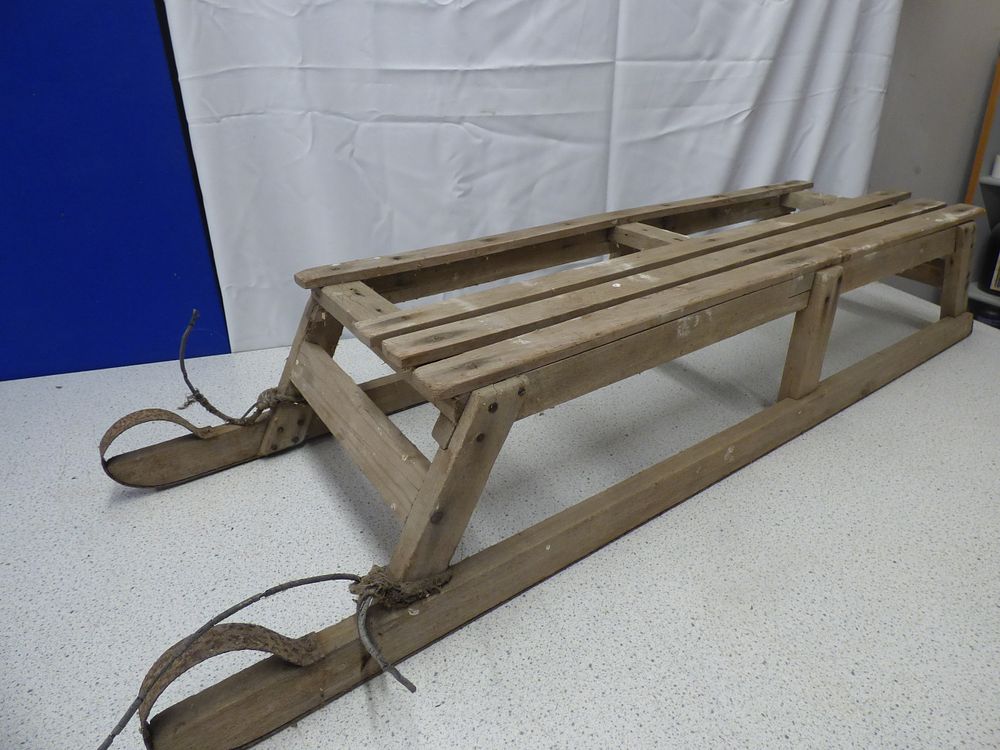 Lot 158: A Vintage Wooden Sledge with Metal Runners