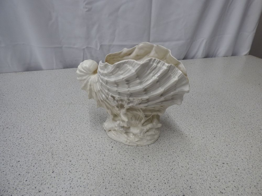 Lot 188: A White Belleek Nautilus Shell-Shaped Decorative Bowl or Planter