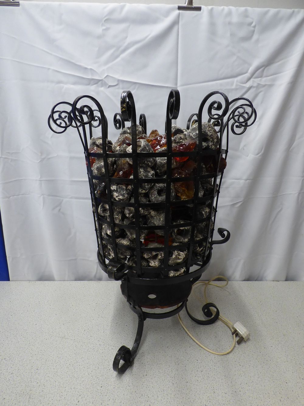 Lot 198: A Black Metal Electric Fireplace Basket Heater